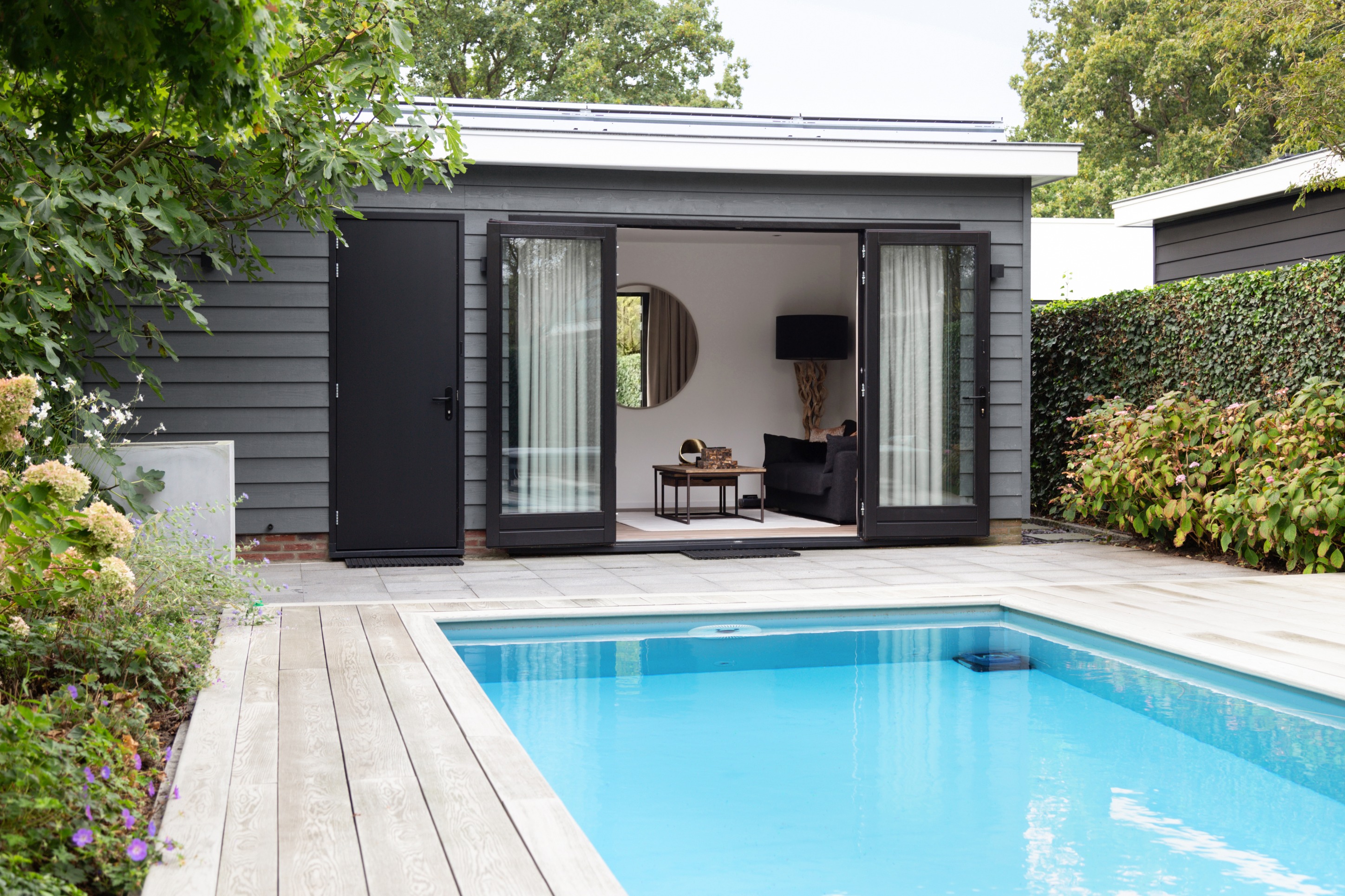 tuinkamer als luxe poolhouse