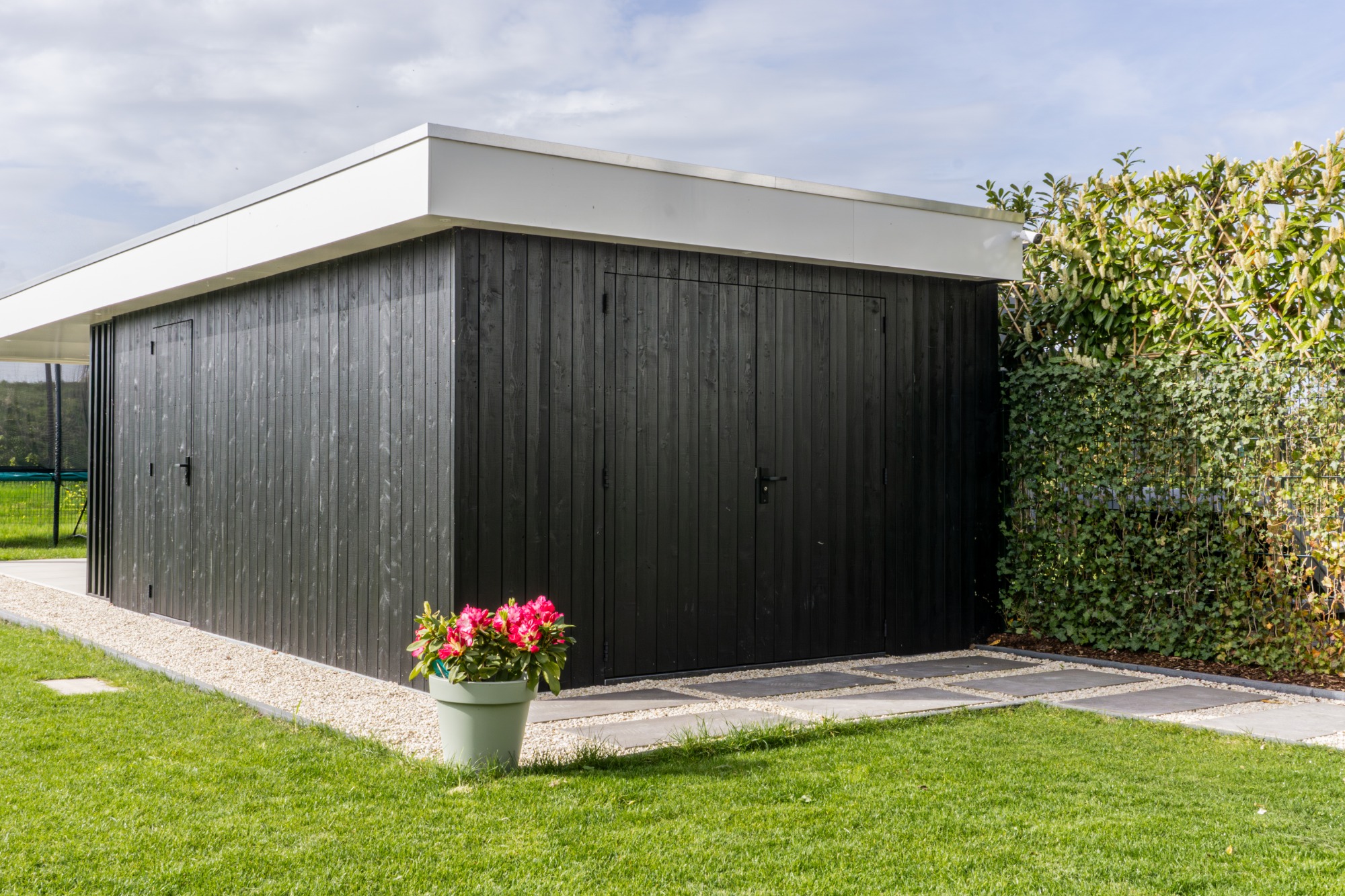Luxe overkapping met berging en lounge | Apard