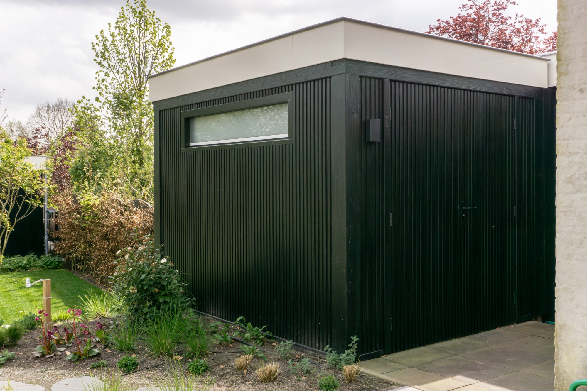 Tuinkamer met bar en aparte berging in Goirle | Apard
